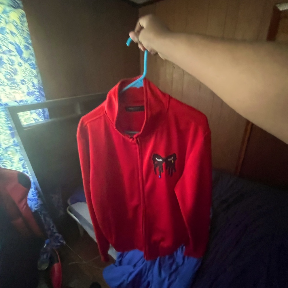 This is a red roku jacket,size large about 3 years old but only worn 6 times